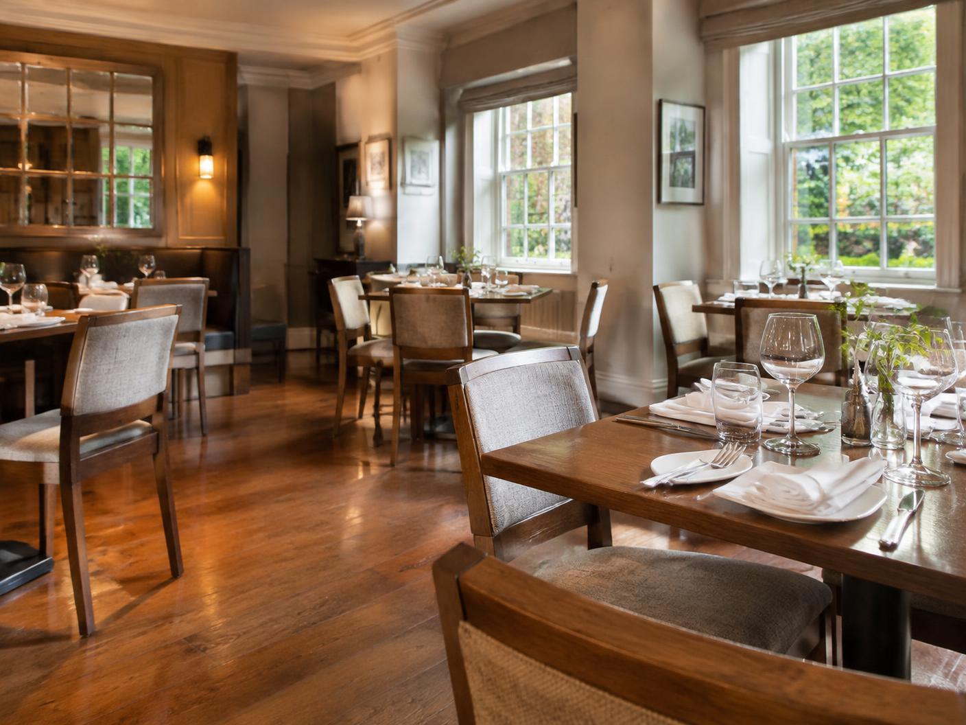 Restaurant dining room with set tables